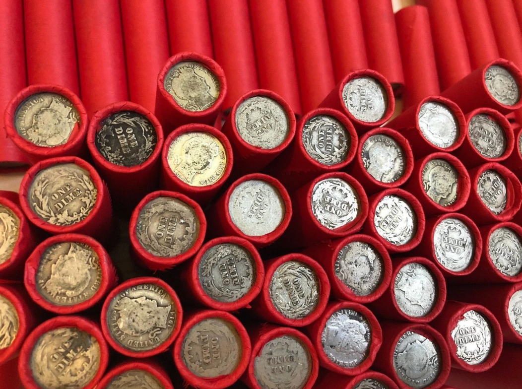 TIGHTLY CRIMPED RED BANK WRAPPED ROLLS OF WHEAT CENTS WITH BARBER DIMES SHOWING