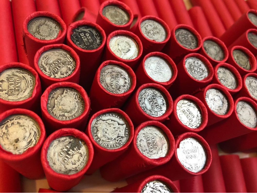 TIGHTLY CRIMPED RED BANK WRAPPED ROLLS OF WHEAT CENTS WITH BARBER DIMES SHOWING