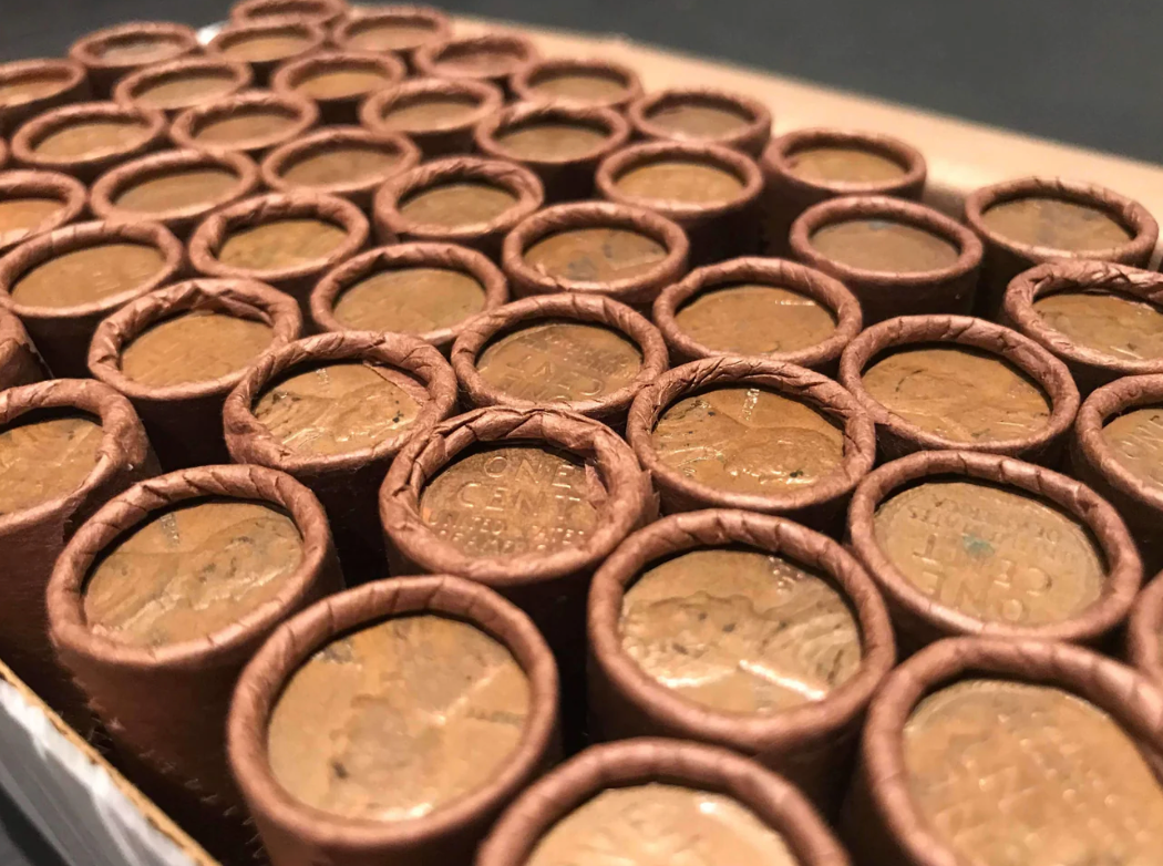 TIGHTLY CRIMPED ROLLS OF OLD WRAPPED WHEAT PENNIES
