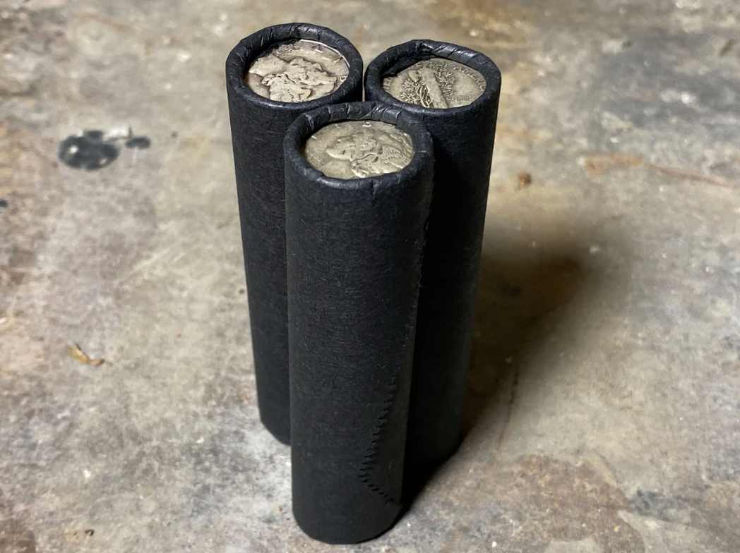 1 SILVER MERCURY DIME showing on vintage unsearched old black wheat penny roll u