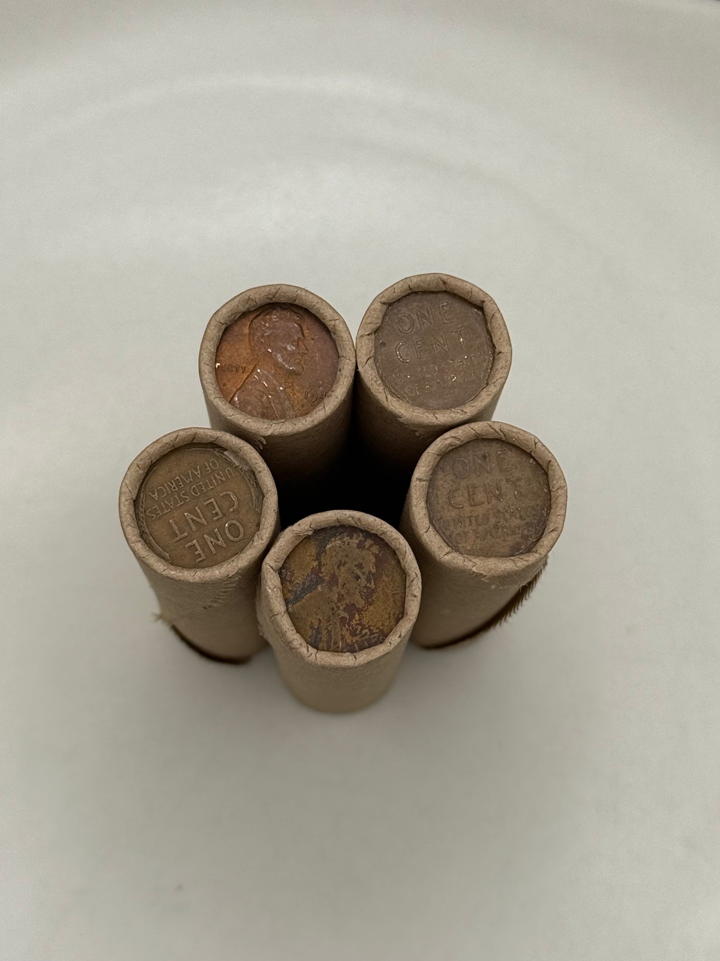 Tightly Crimped Brown Rolls of Old Wrapped Wheat Pennies