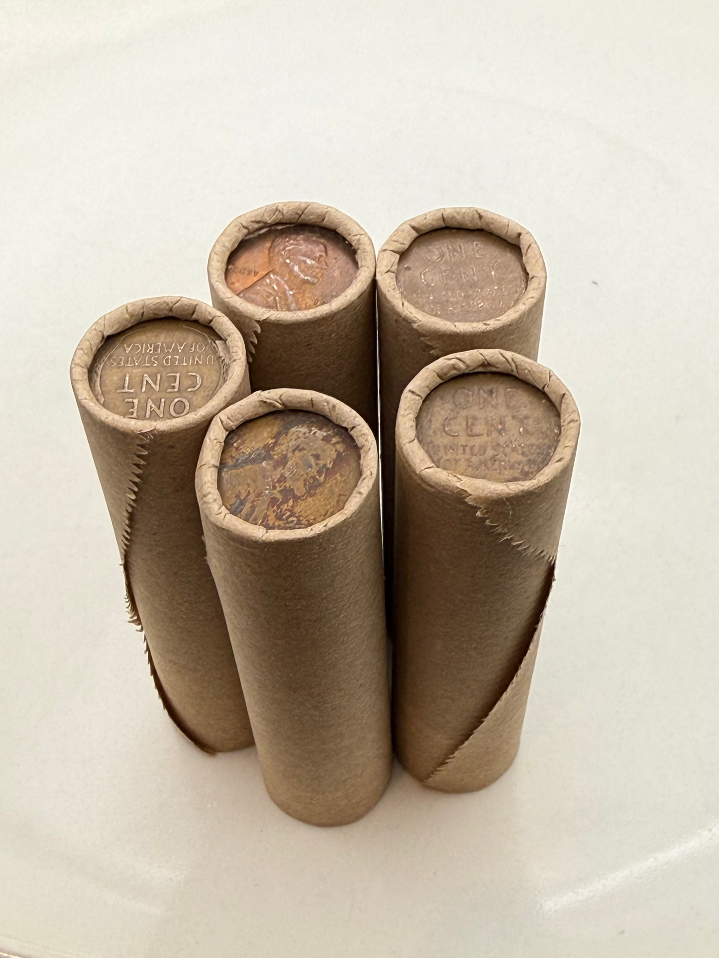 Tightly Crimped Brown Rolls of Old Wrapped Wheat Pennies