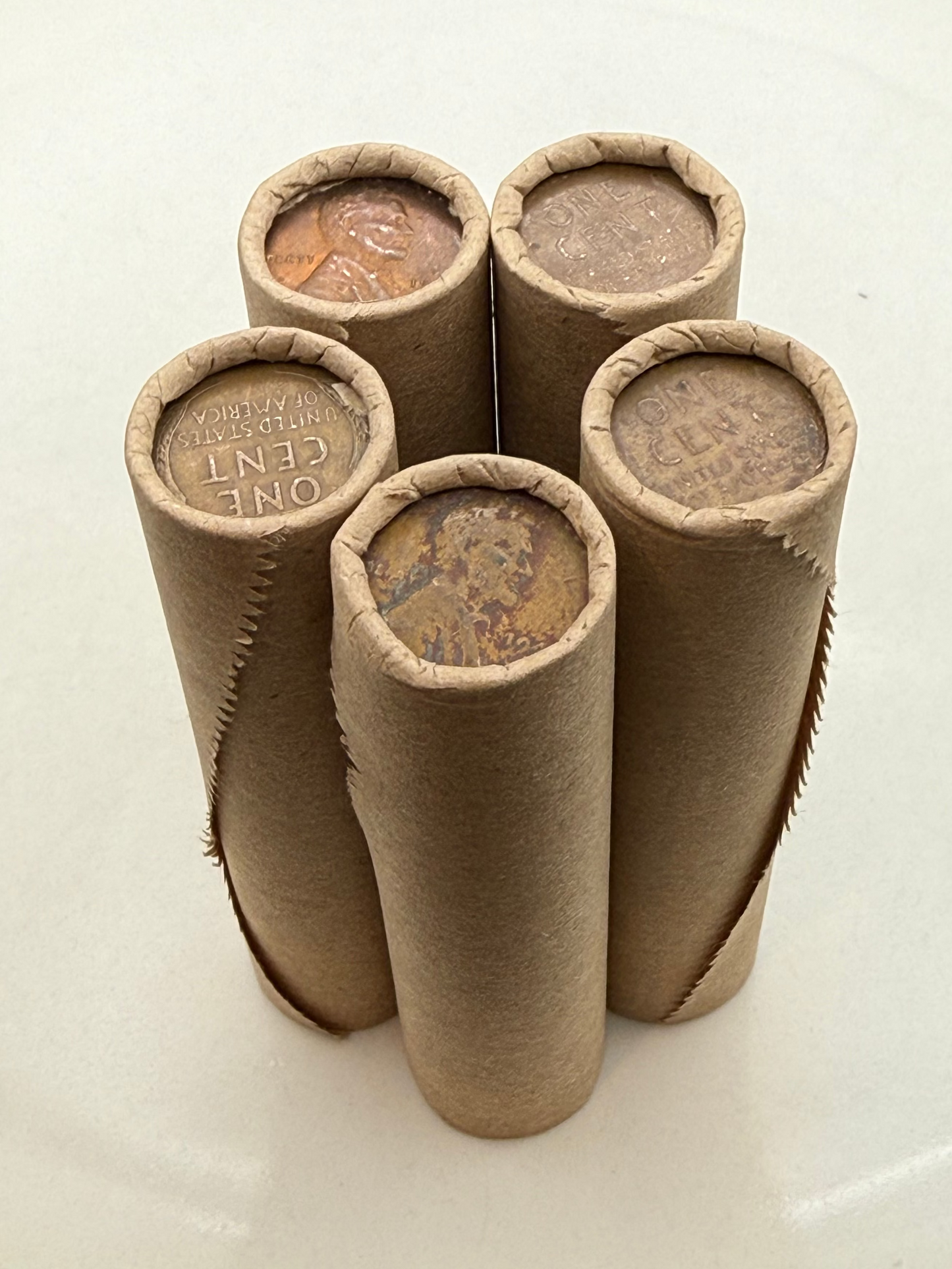 Tightly Crimped Brown Rolls of Old Wrapped Wheat Pennies