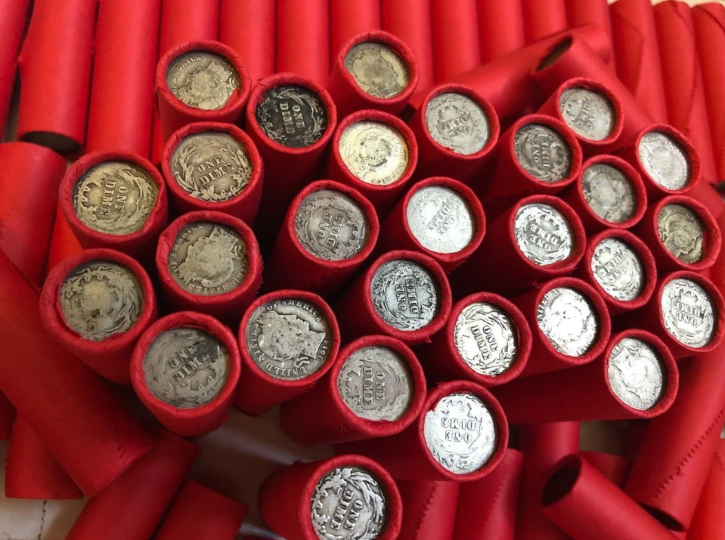 TIGHTLY CRIMPED RED BANK WRAPPED ROLLS OF WHEAT CENTS WITH BARBER DIMES SHOWING