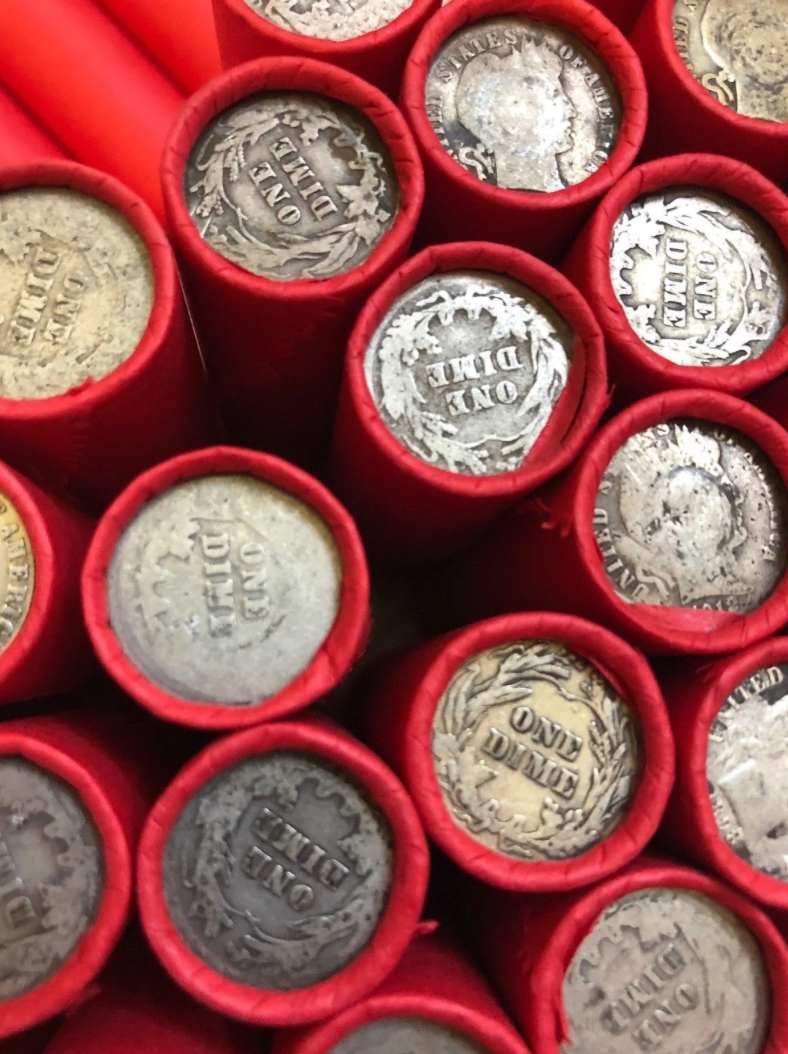 TIGHTLY CRIMPED RED BANK WRAPPED ROLLS OF WHEAT CENTS WITH BARBER DIMES SHOWING