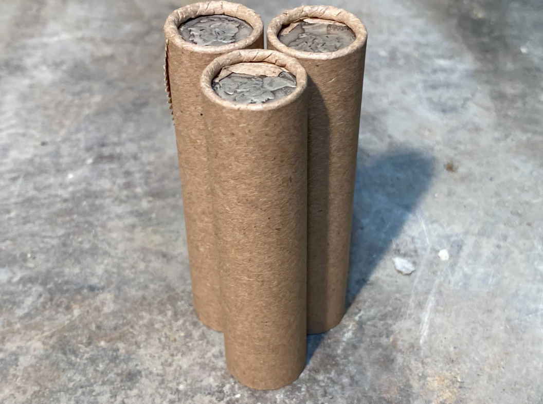SILVER MERCURY DIME showing on old vintage unsearched old brown wheat penny roll