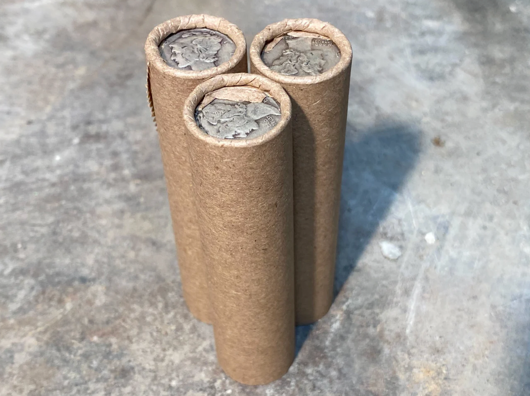 SILVER MERCURY DIME showing on old vintage unsearched old brown wheat penny roll