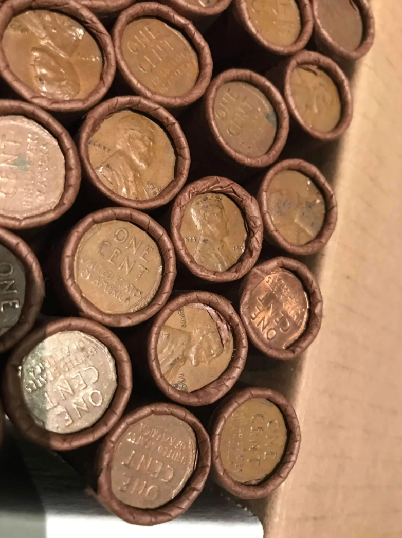 TIGHTLY CRIMPED ROLLS OF OLD WRAPPED WHEAT PENNIES